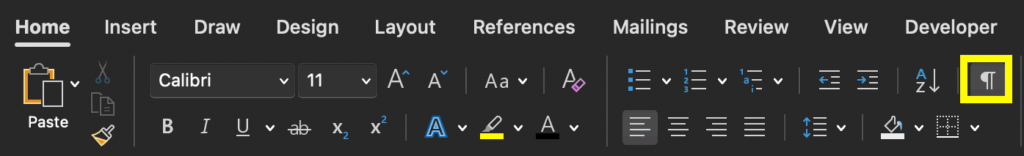Screenshot of the home ribbon with the show/hide special characters option outlined in yellow